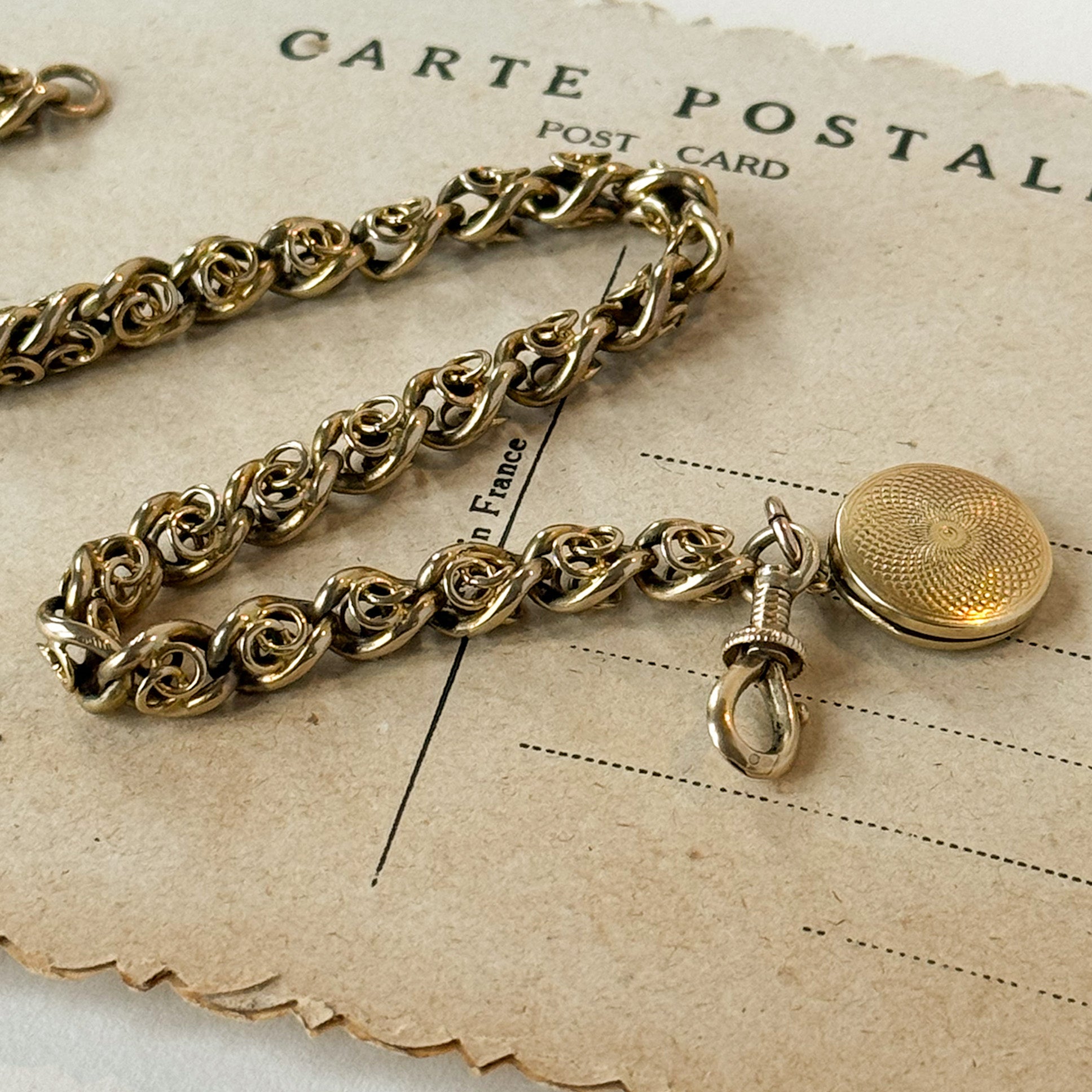 Unique 15ct and 9ct gold antique bracelet with a locket and swivel clasp 