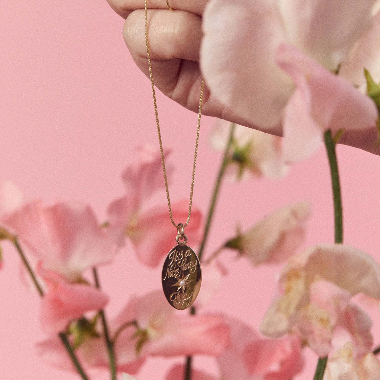 Hand engraved keepsake pendant charm in solid gold 